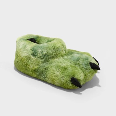 These Kai Dinosaur Claw Slippers from Cat & Jack™ will keep your child's feet toasty and cozy. The closed-toe slippers are made of faux fur with a slip-on design for quick and easy wear, and the black dino claws at the front, paired with a gray-and-brown silhouette, help make them an instant hit with your child. They also sport a no-heel design with an indoor/outdoor outsole and grippers for versatile wear. Cat & Jack™: Classics with an imagination of their own. Silly Slippers, Dino Slippers, Claw Slippers, Dinosaur Claw, Dinosaur Slippers, Epic Clothing, Green Slippers, Lgbt Humor, Unicorn Slippers