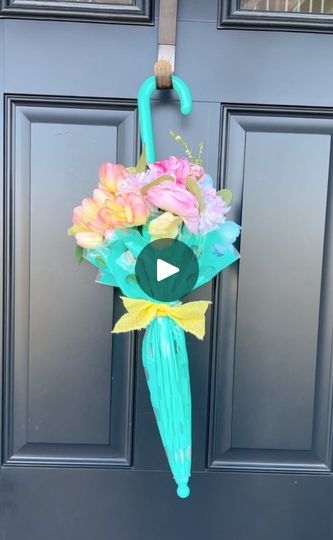 901K views · 24K reactions | she turned an umbrella into a spring wreath | she turned an umbrella into a spring wreath

this diy arts & crafts video shows how to turn an ordinary umbrella into a beautiful wreath for spring and... | By Brooklyn B | With a beautiful umbrella for
spring and here's what you do. You're going to loosen it a
little bit and plant it right between your legs like that.
Now, I have some gorgeous spring flowers and you take
your flowers and put them right in between these little holes
just like this. I have a nice, gorgeous pink bouquet Like
this. Gonna put these on the side here. You want to do
north, south, east, west here buns. I think they match the
umbrella. They look really cute, okay? Alright, so this is
what you're looking for and now here's what's going to ha Small Umbrella Decorations, Umbrella Door Decoration, Umbrella Craft Ideas, Umbrella Flower Arrangement, Flower Parasol, Mesh Decorations, Spring Wreaths For Front Door Diy, Umbrella Baby Shower, Umbrella Wreath