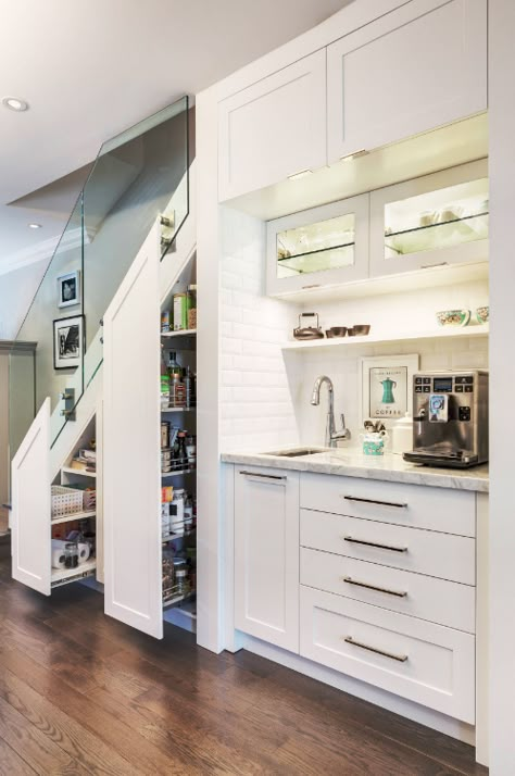 We share 11 genius ideas for awkward under-stair space. Under-stair space is often neglected or not used to its full potential so let our list help inspire your creativity. Including this smart and practical idea for an organised pantry. Using pull-out shelving makes clever use of this tricky space. Click the image for this and more great tips. Bar Under Stairs, Kitchen Under Stairs, Under Stairs Pantry, تحت الدرج, Food Storage Cabinet, Stairs In Kitchen, Model Dapur, Stairs Storage, Pantry Room