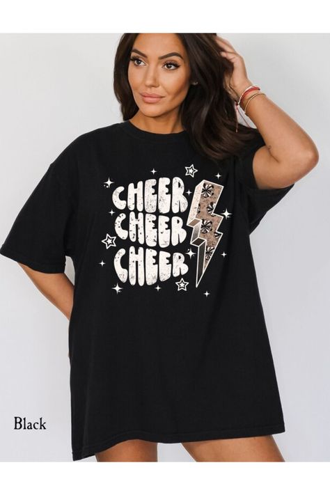 Get ready to make a bold fashion statement while showcasing your cheerleading spirit with the Cute Trendy Oversized Cheerleading T-Shirt. This trendy and comfortable t-shirt combines a playful oversized fit with a cheerleading-inspired design, allowing you to look effortlessly stylish while embracing your love for cheer. #cheereleader #cheercoach #cheermom #cheermama #competitivecheer #competitioncheer Competitive Cheer Shirts Designs, Cheer Shirt Ideas, Cheer Shirts Designs, Cheer Shirt, Cheer Stuff, Competitive Cheer, Cheer Coaches, Cheer Outfits, Cheer Shirts