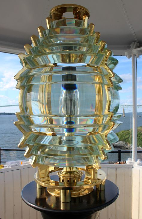 This beautiful reproduction Fresnel lens now sits in the lantern room of the Rose Island Lighthouse in Newport, Rhode Island. Fresnel Light, Lighthouse Lantern, Lighthouse Architecture, Candle On The Water, Diy Lighthouse, Rhode Island History, Rose Island, Fresnel Lens, Lighthouse Lighting