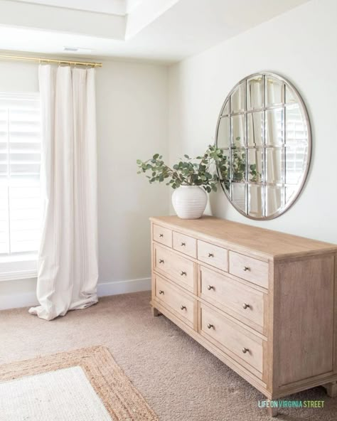 2020 Spring Home Tour / Wooden dresser with round mirror, white vase, faux greenery, and white curtains. Dresser Decor Bedroom, Spring Decorating Ideas, Spring Decorating, Dresser Mirror, Couple Bedroom, White Vase, Bedroom Dressers, Dresser Decor, Small Room Bedroom