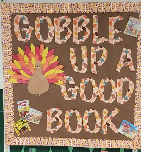 Fall Themed Library Bulletin Boards, November Bulletin Boards For Library, Thanksgiving Reading Bulletin Boards, Gobble Up A Good Book Bulletin Board, Thanksgiving Library Bulletin Board Ideas, Thanksgiving Bulletin Board Ideas For Library, Library Holiday Bulletin Boards, Thanksgiving Poster Board Ideas, Fall Decorations For Library