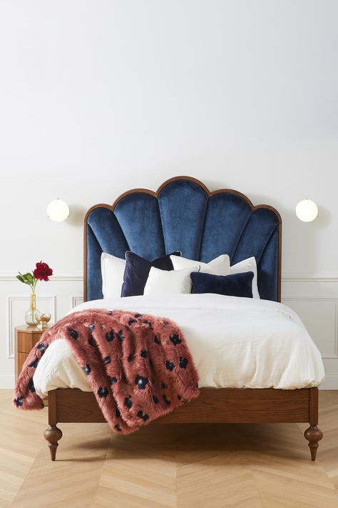 Every master bedroom deserves a statement headboard, and this grand art deco-style midnight/navy blue headboard tops the list. It perfectly complements the dark walnut wooden bedframe which is slightly raised from the floor to give the illusion of more space in the bedroom. A bed this grand deserves the most plush accessories. (Pictured: Sofia Bed from the Anthropologie x Soho Home collection). #bedroomideas #bedideas #bedroominspo #headboard #bed Navy Blue Headboard, Soho House Barcelona, Blue Headboard, Velvet Headboard, Soho Home, Soho House, Style At Home, Upholstered Headboard, Cheap Home Decor