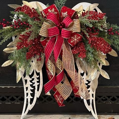 (4) Wreaths of Joy - Last nights angel wing we designed! I think this... | Facebook Angel Wings Wreath, Metal Angel Wings, Angel Wing Crafts, Memorial Wreath, Angel Wing Design, Diy Valentines Day Wreath, Mesh Ribbon Wreaths, Angel Wings Design, Grave Flowers