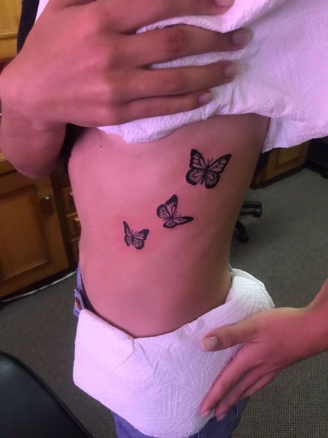 Butterfly Tattoo On The Ribs, Butterflies Tattoo On Ribs, Butterfly Tattoos On Ribs, Ribcage Tattoo Butterfly, Rib Tattoos For Women Butterflies, Butterfly Ribs Tattoo, Tattoo Ideas On Side Rib Cage, First Time Tattoo Ideas Woman Simple, Butterflies On Ribs Tattoo