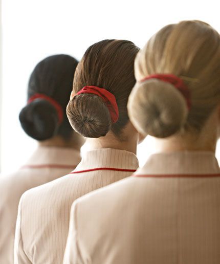 Flight attendants share their most coveted beauty secrets Flight Attendant Hair, Emirates Flights, Emirates Cabin Crew, Airline Cabin Crew, Airline Uniforms, Chignon Bun, Flight Attendant Uniform, Emirates Airline, Flight Attendant Life