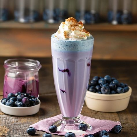 This Blueberry Cheesecake Milkshake Recipe offers a decadent fusion of rich cheesecake and vibrant blueberries in a refreshing milkshake form. Perfect for dessert or a luxurious treat, this milkshake brings the classic flavors of a blueberry cheesecake to your glass, topped with whipped cream and crushed graham crackers for an authentic cheesecake experience. Preparation Time: 10 minutes Cooking Time: 0 minutes Resting Time: 0 minutes Total Time: 10 minutes Serving: 2 Ingredients: - 1 cup... Authentic Cheesecake, Using Frozen Blueberries, Cheesecake Milkshake, Blueberry Milkshake, Rich Cheesecake, Milkshake Recipe, Milkshake Recipes, Blueberry Cheesecake, 2 Ingredients