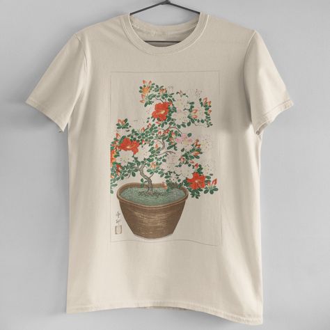 Vintage Potted Blooming Azalea Tee Brand New! Our In House T-Shirts Are High Quality And Printed On Demand. This Tee Features Light Natural Tan Color, Vintage Print Of Blooming Azalea In Brown Pot, Lovely Orange Toned Flowers, Relaxed Unisex Fit, And 100% Cotton. Size S-Xl Available (Model Is Wearing A Size M) Flower Print Shirt, Vintage Graphic Tees, Cycling Tops, Bell Sleeve Shirt, Half Sleeve Shirts, Vintage Princess, Nature Shirts, Clothes Aesthetic, Floral Tee