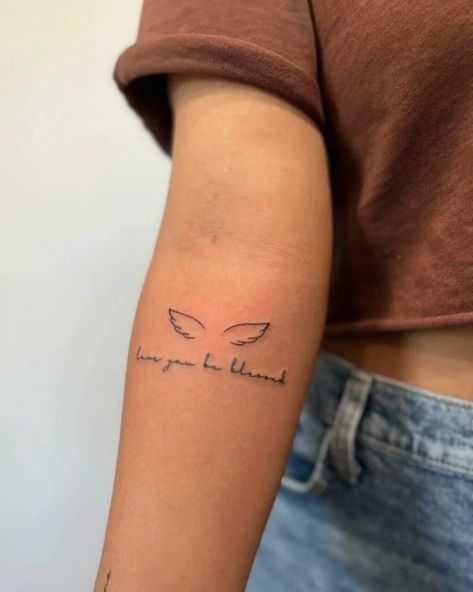 Small Wings with Quote Angel Wings Tattoos For Women, Wings With Name Tattoo, Eagle Wings Tattoo For Women, Mini Angel Wings Tattoo, Wings With Words Tattoo, Angels Wings Tattoo, Angel Wings With Words Tattoo, Wings Tattoo For Women, Delicate Angel Wings Tattoo