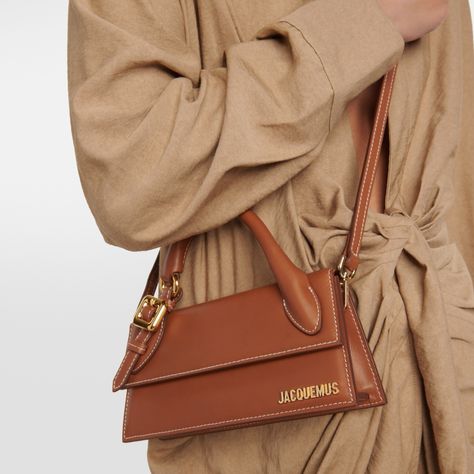 Step out in style with the Jacquemus ‘Le Chiquito’ Long Bag. This statement piece is not just a bag; it’s an accessory that transforms any outfit! 👜✨ Shop from our link in the Bio! . . . . #Jacquemus #LeChiquito #FashionStatement #LuxuryStyle #BagGoals #ChicAccessories #OOTD #FashionInspo Jacquemus Le Chiquito Long, Le Chiquito Long, Jacquemus Le Chiquito, Long Outfit, Registered Nurse, Brown Bags, Chic Accessories, French Fashion, Contrast Stitch