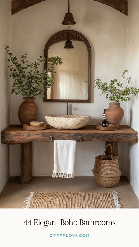 Transform your bathroom into a serene Boho paradise with these dreamy ideas! From earthy tones and lush greenery to bold accent walls and eclectic tiles, this blog is packed with inspiration for creating a stylish and relaxing space. Perfect for anyone who loves blending textures, natural elements, and a touch of creativity. Save this for your next bathroom makeover! 🌿✨ #BohoBathroom #BathroomDesign #HomeDecorInspiration Boho Tiles Bathroom, Bathroom Decor Rustic Modern, Desert Themed Bathroom, Earthy Bathroom Aesthetic, Wabi Sabi Bathroom Inspiration, Natural Bathroom Design Earth Tones, Earthy Bathrooms, Earthy Home Aesthetic, Surf Bathroom