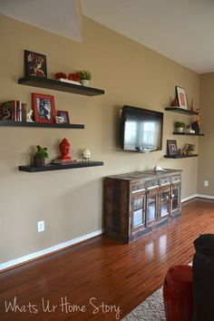 Great ideas on how to decorate around a TV: use floating sheves, convert a buffet into a TV console How To Decorate Around A Tv, Reclaimed Wood Media Console, Shelves Around Tv, Ikea Floating Shelves, Shelf Arrangement, Floating Shelves Bedroom, Floating Shelves Living Room, White Floating Shelves, Floating Shelves Bathroom