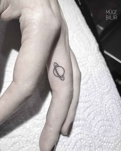 Planet Tattoos Minimalist, Ideas For First Tattoo For Women, Saturn Finger Tattoo, Saturn Tattoo Ideas, Small Saturn Tattoo, Saturn Tattoo Minimalist, Cute Alien Tattoo, Spaceship Tattoo, Planet Tattoo