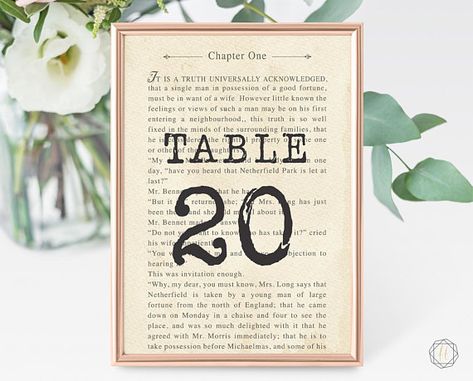 Custom made table numbers on pages of your favorite book. BookNook Marjorie Mae does custom wedding design 15 Book Wedding Ideas for Literary Lovers Wedding Table Numbers Vintage, Book Lovers Wedding, Book Table Numbers, Number Book, Natural Wedding Decor, Wedding Table Themes, Book Themed Wedding, Literary Wedding, Vintage Wedding Table