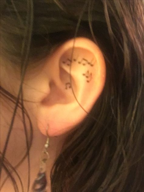 Music notes ear tattoos Music Note Ear Tattoo, Ear Music Tattoo, Music Ear Tattoo, Music Lover Tattoos, Cute Ear Tattoos, Mazzy Star Tattoo, Tattoos For Music Lovers, Singer Tattoo, Tattoos About Healing