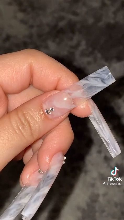 White Marble Nails [Video] | Bling acrylic nails, Long square acrylic nails, Nails White Clear Nail Designs, Long Milky White Nails With Rhinestones, How To Do Marble Acrylic Nails, Clear Long Acrylic Nails, Clear Marble Nails Acrylic, White Marble Nails Acrylic, Clear Tip Acrylic Nails, Clear Square Acrylic Nails, Long Clear Acrylic Nails