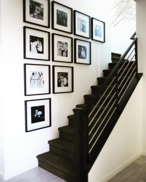 Black Picture Frames Stairs, Black And White Gallery Wall Staircase, Black And White Picture Wall Stairs, Black Frame Gallery Wall Stairs, Wedding Picture Wall Ideas, Mirror And Pictures On Wall, Photos In Stairwell Wall Ideas, Black And White Family Photo Wall, Photo Wall Collage Staircase