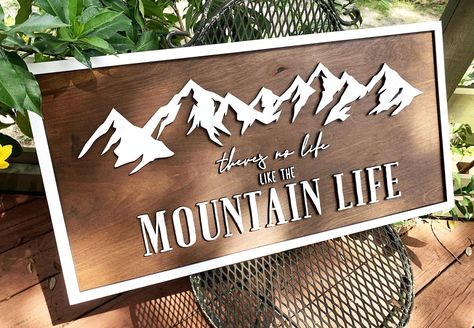 "A beautiful home decor piece makes a perfect addition to any mountain lover's house! This stunning sign is made from laser-cut birch wood and completed with your choice of stain color. Available in several different sizes, this sign is great as an accent or centerpiece! (LENGTH x HEIGHT) 24\" x 12\" 28\" x 14\" (shown) 32\" x 16\" 36\" x 18\" Includes hanging hooks on the back of the sign so you can attach it to a wall. ----:| TURNAROUND AND SHIPPING |:---- We allow a minimum of twenty-four hou Lodge Signs Diy Rustic Wood, Mountain Welcome Sign, Wood Burned Mountains, Mountain Decorating Ideas, Cricut Wood Sign, Mountain Chic Decor, Mountain Room Decor, Mountain Airbnb, Mountain Lodge Decor