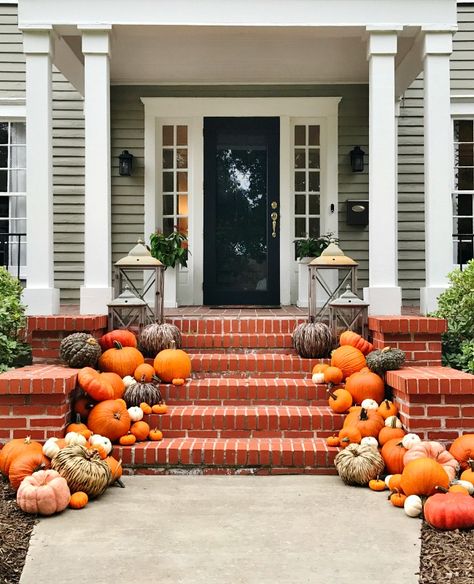 When Your Pumpkins Can Be Seen From Outer Space - Thistlewood Farm - If you drive down the historic streets of McKinney Texas looking for fall decorating ideas for the front steps and see a display that looks a little like this. A display that looks a little like a home for lost pumpkins. Don’t worry. Don’t fret. Don’t be alarmed. It’s just a little front porch decorating … Pumpkin Front Steps, Pumpkins On Front Porch Steps, Pumpkin Steps Decor, Front Door Pumpkin Display, Pumpkins On Steps, Pumpkins On Porch Steps, Pumpkin Displays Outside, Front Porch Pumpkins Display, Outdoor Pumpkin Display