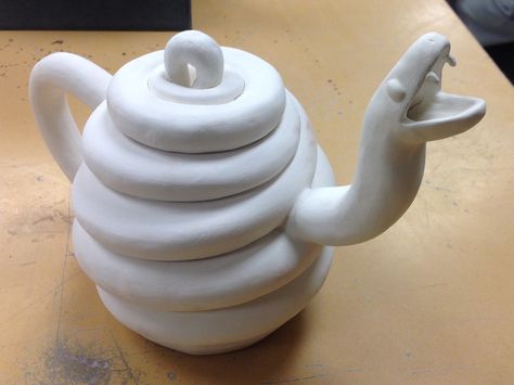 My snake teapot got fired. There are a few small cracks but I think the glaze with cover them up so I can still use it. Coil Pottery Teapot, Ceramic Coil Projects, Sculptural Teapot, Snake Mug, Ceramic Design Ideas, Coil Pot, Ceramic Pinch Pots, Ceramics Painting, Coil Pottery