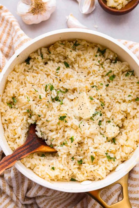 Garlic Butter Rice is the perfect side dish for dinner! A simple mix of butter, sautéed onion, garlic, and chicken broth gives this rice tons of great flavor. It's easy to make and tastes amazing! Buttered Rice Recipe, Garlic Butter Rice, Side Dish For Dinner, Buttery Rice, Rice Pilaf Recipe, Garlic Rice, Easy Rice Recipes, Butter Rice, Incredible Recipes