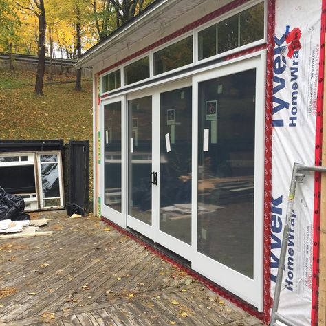 Andersen E-Series triple glaze 16’ x 8’ gliding patio door installed by our friends at Sable Building & Design #fogoisland #renovate #nlrealestate #stjohns #newfoundland #labcity #labrador #cornerbrook #gander #architecture #homedesign #patiodoor #andersenwindows Glass Patio Doors Ideas, Anderson Sliding Patio Doors, Bermuda House, Double Sliding Patio Doors, Anderson Doors, Patio Door Installation, Glass Doors Patio, Slider Door, Addition Ideas