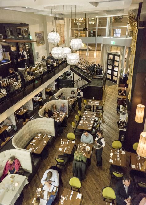 View of the Loulay dining room from the mezzanine Restaurant Mezzanine Design, Restaurant With Mezzanine Floor, Restaurant With Mezzanine, 2 Floor Restaurant Design, Mezzanine Restaurant Design, Restaurant Mezzanine, Mezzanine Cafe, Mezzanine Restaurant, Mezzanine Floor Ideas