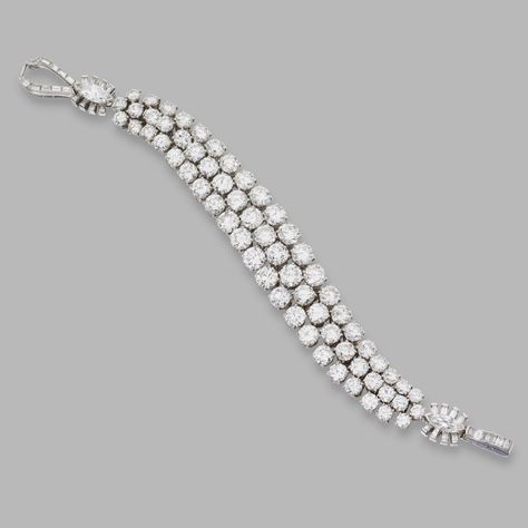 PLATINUM AND DIAMOND BRACELET, HARRY WINSTON, 1949. The highly flexible band set with round diamonds weighing 33.88 carats, accented by baguette and marquise-shaped diamonds weighing 3.49 carats, length 7 inches, numbered 4327, unsigned. Cartier Diamond Bracelet, Harry Winston Jewelry, Diamond Bracelet Design, Fancy Jewelry Necklace, Bracelets Design, Harry Winston, Diamond Jewelry Designs, Tennis Bracelet Diamond, Best Diamond