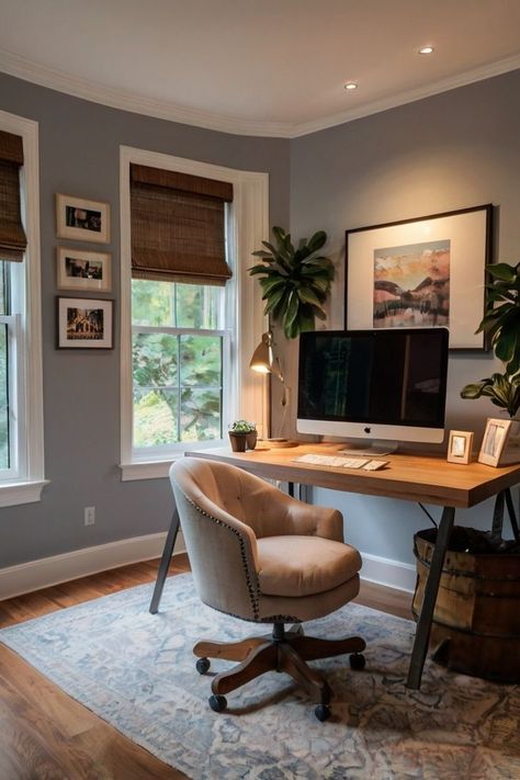 When setting up your cozy home office, think about adding plush seating like a comfy armchair or sofa. Use soft textiles, including a fluffy rug, throw pillows, and a blanket, to layer the area. Add personal items, like framed artwork, family photos, or a small bookshelf, to make it uniquely yours. Cozy Office Space With Couch, Desk With Rug Under, Cozy Coastal Office, Small Office With Tv, Home Office Gray Walls, Small Office Ideas No Windows, Living Room With Desk Area Layout, Cozy Modern Office, Office And Reading Room Ideas