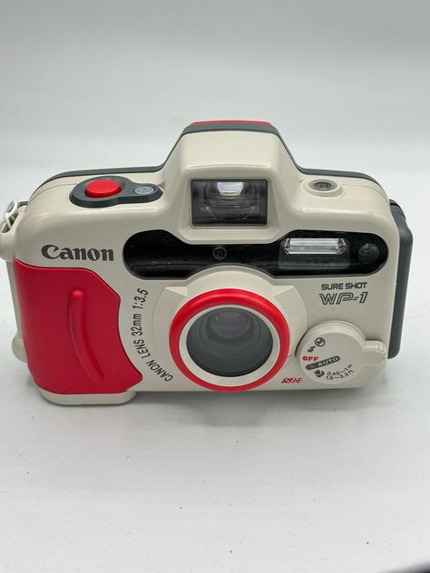 canon WP-1 Sure shot waterproof 35mm film camera mint professionally serviced 90 day warranty! Absolutely beautiful condition and working perfectly. Simple camera to use Beginner Photography Camera, Alexandria Bay, Simple Camera, Vinyl Aesthetic, Cute Camera, Retro Gadgets, Waterproof Camera, Old Camera, Canon Camera