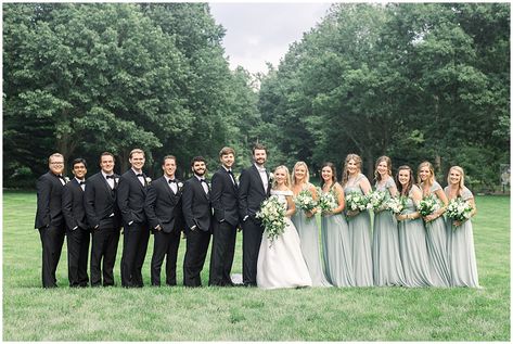 Black And Sage Tuxedo, Sage Green Bridesmaid Dress And Groomsmen, Sage Green And Black Groomsmen Attire, Sage Green And Black Tux Wedding, Groomsmen With Sage Green Bridesmaids, Sage Green And Black Bridal Party, Black Tux Sage Green Tie, Black Tux With Sage Green Tie, Black Tux With Sage Green