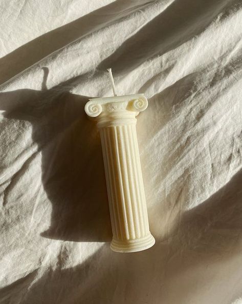 Bring a touch of ancient Rome to your decor with our exquisite Roman Column Candle. Handcrafted with premium wax, this candle features intricate details that mimic the iconic columns of ancient Roman architecture. Perfect for creating a romantic or sophisticated ambiance, or as a unique gift for history lovers and fine things aficionados. Light it up and experience the timeless beauty of ancient Rome in your own home. Order now Greek Room, Sculpture Candles, Candle Room Decor, Bennet Sisters, Candle Logo Design, Magic Candles, Candle Sculpture, Column Candle, Ancient Roman Architecture