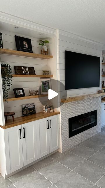 Gilad Uriel on Instagram: "📺 I loved working on this custom entertainment center! Aaron and Shana had recently purchased a new build home in Sun City Center that had plenty of space and  bare walls, but they knew they needed to add function and warmth to really call it home.  📋 Aaron and Shana came to me with a few inspiration photos that they found online. They knew they wanted to incorporate shiplap, which are the white boards installed behind the tv and shelves. They also wanted to have some natural wood throughout, so we went with birch butcher block for the shelves and counter tops. The electric fireplace was a nice touch to make the space feel more cozy.   ⚡️The process went smooth and I was able to finish this for them just in time for the holidays.  📞 Message me about your dream Tv And Shelves, Shiplap Tv Wall, Custom Entertainment Center, Farmhouse Entertainment Center, White Entertainment Center, White Boards, Build Home, Fireplace Entertainment Center, White Shiplap Wall