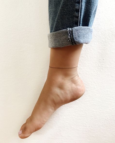 Line Around Ankle Tattoo, Celebrity Ankle Tattoo, Single Needle Ankle Tattoo, Circle Ankle Tattoo, Simple Anklet Tattoo, Ankle Line Tattoo, Tiny Ankle Tattoos For Women, Line Tattoo Ankle, Line Ankle Tattoo