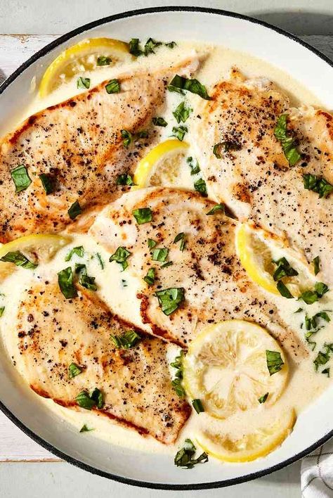 This ultra-quick creamy lemon basil chicken is bright and refreshing. Using whole lemon slices in the sauce adds more depth of flavor than juice and zest alone for an easy chicken dinner Creamy Lemon Basil Chicken, Lemon Basil Sauce For Chicken, Baked Creamy Lemon Chicken, One Skillet Chicken With Lemon Garlic Cream Sauce, Lemon Rosemary Roasted Chicken, Easy Chicken Stew, Lemon Basil Chicken, Bruschetta Chicken Pasta, Quick Chicken Recipes