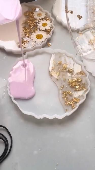 Transform your ideas into reality with our high-quality resin epoxy! Perfect for DIY projects, custom designs, and more. Our epoxy is easy to use and comes in a range of colors and finishes, allowing you to create stunning projects with ease. https://www.tiktok.com/@shopresinmolds #CraftResinEpoxy #DIYProjects #CustomDesigns #StunningProjects Resin Wedding Ideas, How To Make Resin Keychains, Resin Frame Ideas, Resin Crafts Ideas Inspiration, Resina Epoxi Ideas, Resin Art Keychain, Diy Resin Keychain, Diy Resin Tray, Diy Resin Crystals