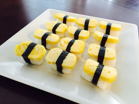 Tamago nigiri sushi Tamago Nigiri, Tamago Sushi, Sushi Nigiri, Bday Celebration, Yellow Food, Sushi Love, Nigiri Sushi, Whats For Lunch, Yellow Foods