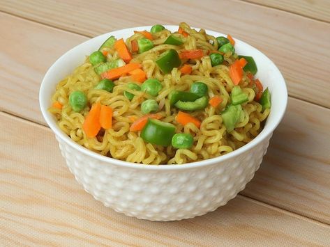 Photo mixed veg masala maggie noodles in... | Premium Photo #Freepik #photo #indian-breakfast #chinese-noodles #appetizer #homemade-food Maggie Noodles, Instant Noodles, Wooden Background, Food Snapchat, A Bowl, Side Effects, Premium Photo, Noodles, Bowl