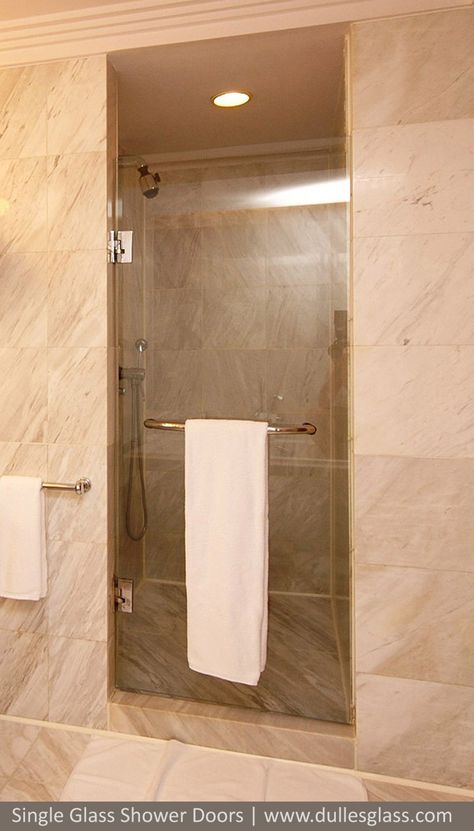 This single shower door features a towel bar combination handle, for a convenient place for your towels. It is shown with chrome handles. Note how luxurious the marble bathroom tiles look with this shower door! Marble Bathroom Tiles, Single Shower Door, Frameless Sliding Doors, Custom Shower Doors, Marble Tile Bathroom, Shower Door Handles, Small Toilet, Shower Towel, Guest Bathrooms