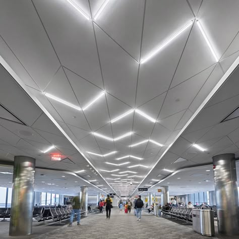 Go where no light has gone before! Reinvent your ceiling with T-BAR FLEX, a lighting product that replaces the cross tee in DESIGNFlex Ceiling Systems by Armstrong Ceiling Solutions. Featuring: BWI Thurgood Marshall Airport – Baltimore, MD. Airport Hallway, Airport Ceiling, Escalator Design, Airport Lighting, Double Height Lobby, Ceiling Solutions, Sky Ceiling, Thurgood Marshall, Armstrong Ceiling