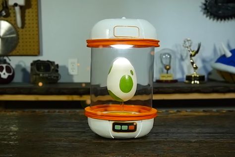 Do-It-Yourself Pokémon Egg Incubator Pokemon Egg Incubator, Egg Incubator Diy, Pokémon Egg, Pokemon Go Crafts, Pokémon Toys, Themed Hotel Rooms, Pokemon Bedroom, Pokemon Eggs, Pokemon In Real Life