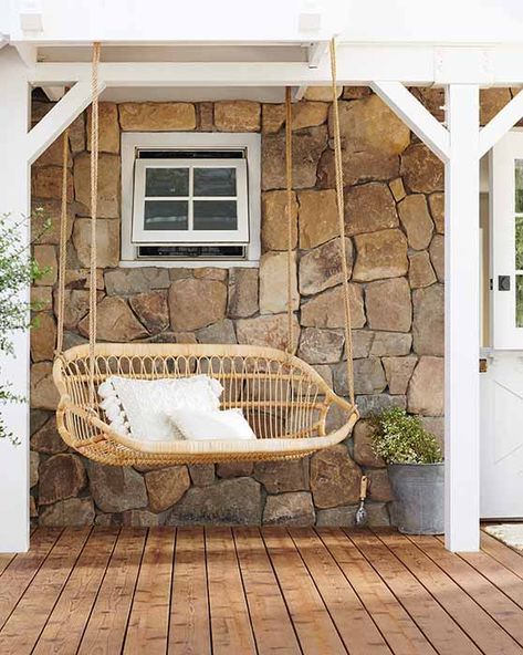 Gorgeous Serena & Lily rattan hanging bench swing adorned with neutral cushions on a patio. Hanging Bench, Beach Pillow Covers, Hanging Rattan Chair, Rattan Bench, Hanging Rattan, Neutral Cushions, Hanging Chair Outdoor, Porch Swings, Future Garden