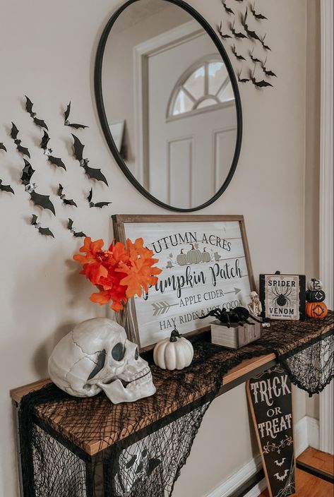 #halloweendecorationideas #consoletableideas #halloweendecoration #october #entryway Halloween Decorations Entryway Table, Halloween Decor For Entry Table, Entrance Table Halloween Decor, Hallway Table Halloween Decor, Farmhouse Halloween Entry Table, Fall House Decorations, Diy Halloween Spider, Halloween Entryway, Scream Halloween