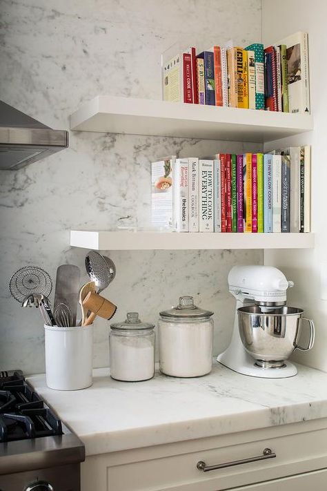 Fabulous kitchen features a stacked white floating cookbook shelves suspended over a white KitchenAid Mixer. White Kitchenaid Mixer, Kitchen Bookshelf, Cookbook Storage, Cookbook Shelf, Kabinet Dapur, Fabulous Kitchens, Kitchen Cookbook, Kitchen Corner, Transitional Kitchen