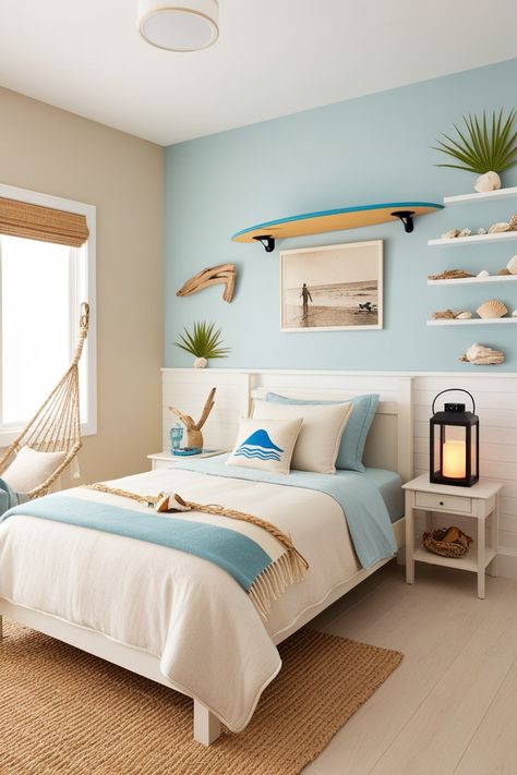 This surfer-inspired bedroom features light coastal colors like sandy beige, soft blue, and white. The bed includes a white comforter, surfer pillow, and a beach throw blanket. A surfboard is mounted on the wall, with a vintage beach photograph framed nearby. The room has a light wood floor with a jute rug and shelves displaying seashells, driftwood, and tropical plants. A hammock chair in the corner adds a laid-back vibe, while warm lighting from a lantern-style lamp sets the mood. Displaying Seashells, Bedroom Ideas For Teenage Boys, Surfer Bedroom, Boys Bedroom Decor Ideas, Surfer Girl Bedroom, Surfer Room, Beach Throw Blanket, Beach Themed Bedroom, Boy Girl Bedroom