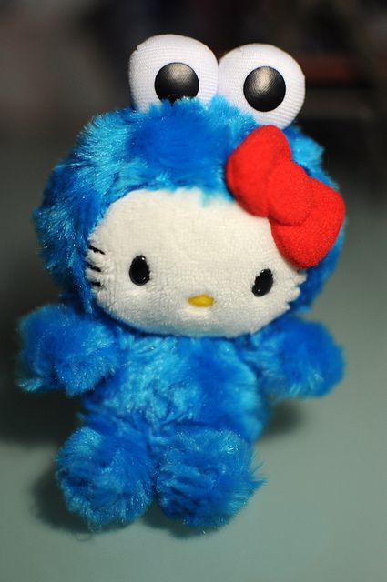 cookie monster -> hello kitty by etherjag, via Flickr Hello Kitty Cookie Monster, Cookie Monster Hello Kitty, Hello Kitty Fugglers, Sanrio Plush Aesthetic, Cookie Monster Pfp, Cookie Monster Aesthetic, Blue Things Aesthetic, Hello Kitty Merch, Cookie Monster Wallpaper