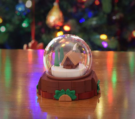 Snowglobe | Hey everyone! Here's another little Christmas bu… | Flickr Lego Snow Globe, Lego Christmas, Seasonal Changes, Winter Village, Lego Ideas, Snow Globe, I Made It, Made It, Snow Globes