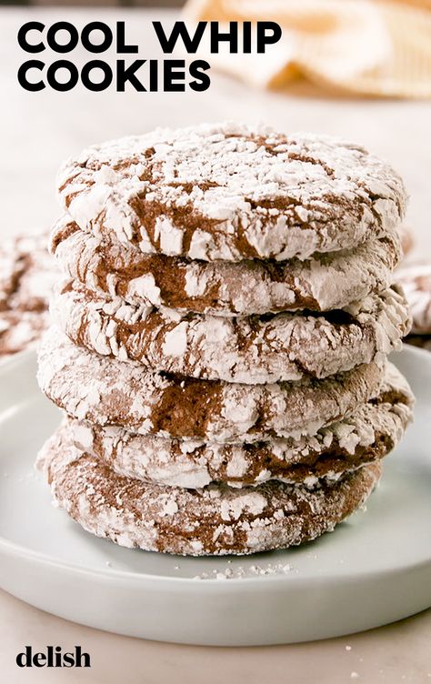 4-Ingredient Cool Whip Cookies use the most GENIUS cake mix hack. Get the recipe at Delish.com. #recipe #easy #easyrecipes #delish #cookies #baking #dessert #chocolate #coolwhip #whippedcream #dessertrecipes #cakemix #hack #hacks #bakinghack Cool Whip Cookies, Chocolate Crinkle Cookies, Egg Cake, Chocolate Crinkles, Crinkle Cookies, Chocolate Cake Mixes, Cake Mix Cookies, Köstliche Desserts, Cool Whip