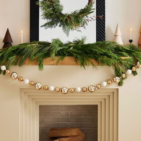 Holiday Decor | West Elm West Elm Christmas, Christmas Ball Garland, Jute Garland, Modern Christmas Ornaments, Traditional Holiday Decor, Christmas Wreaths & Garlands, Ornament Garland, Holiday Storage, Ball Garland